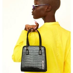 Poppy Lissiman Crikey Baby mini purse with long strap black (gives Staud vibes)